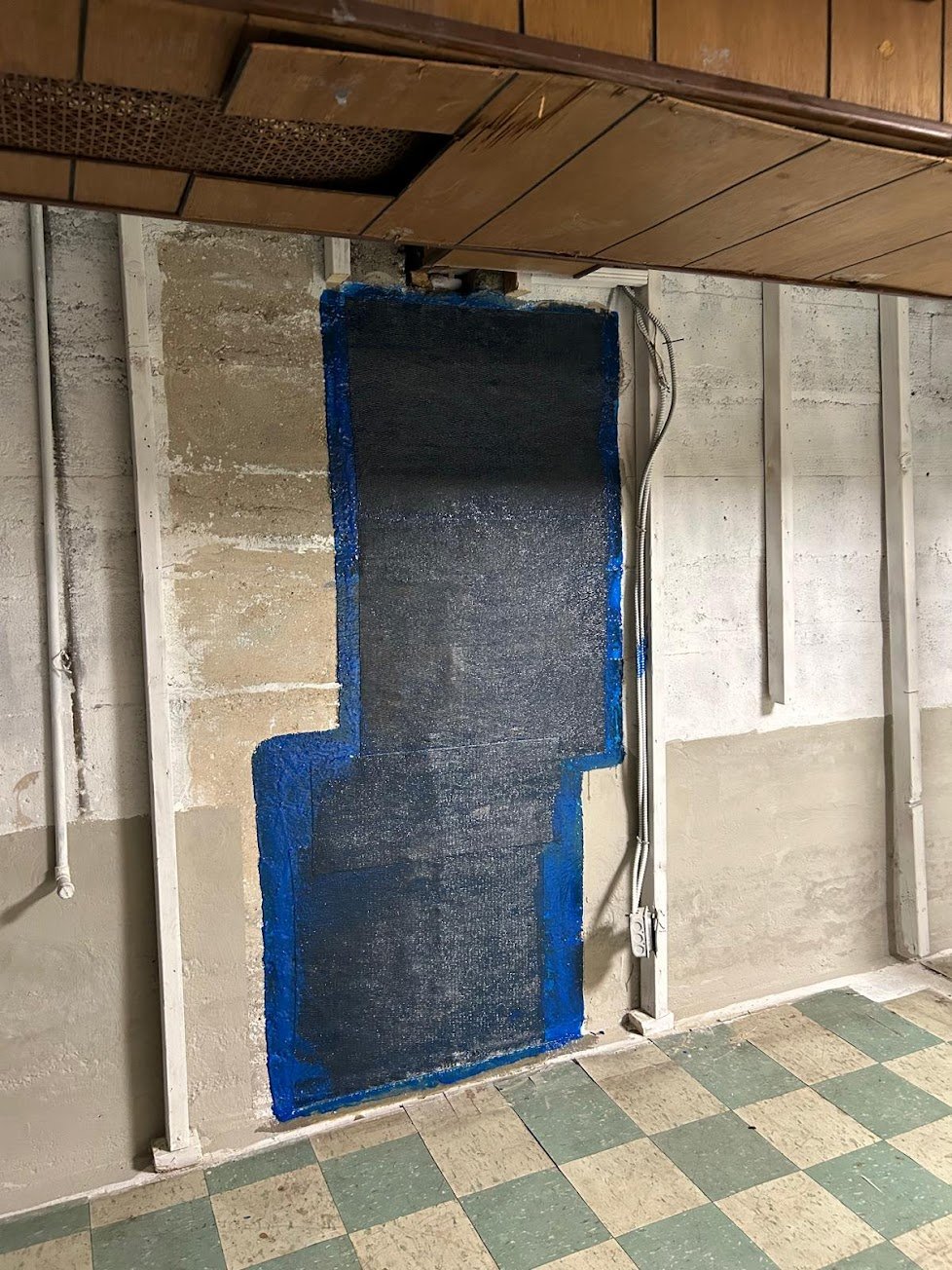 After: leaking basement wall crack repair with carbon fiber structural reinforcement in Bronx, NY