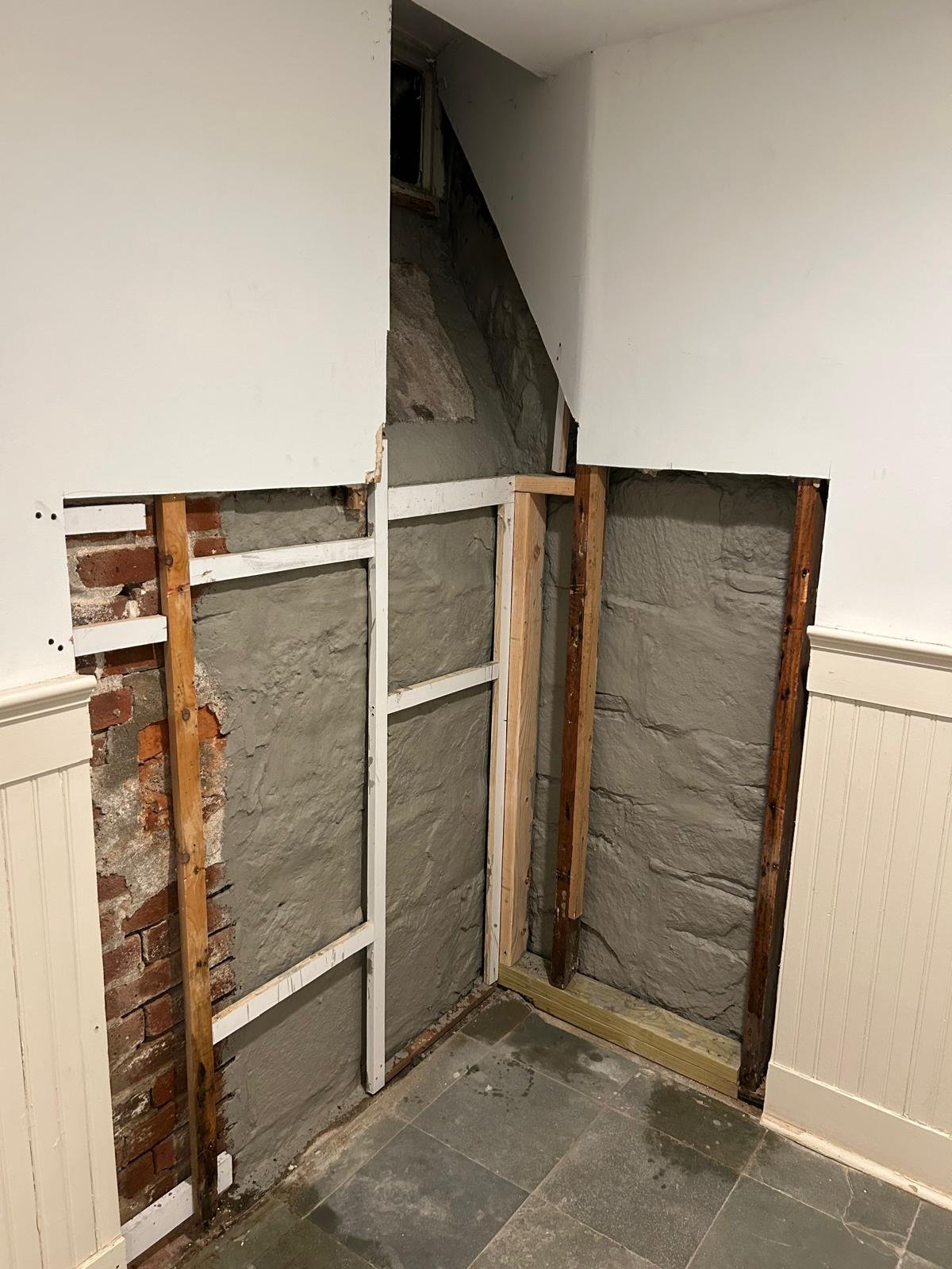 After: old masonry foundation repair with mortar joint rebuild and waterproofing in Norwalk, CT
