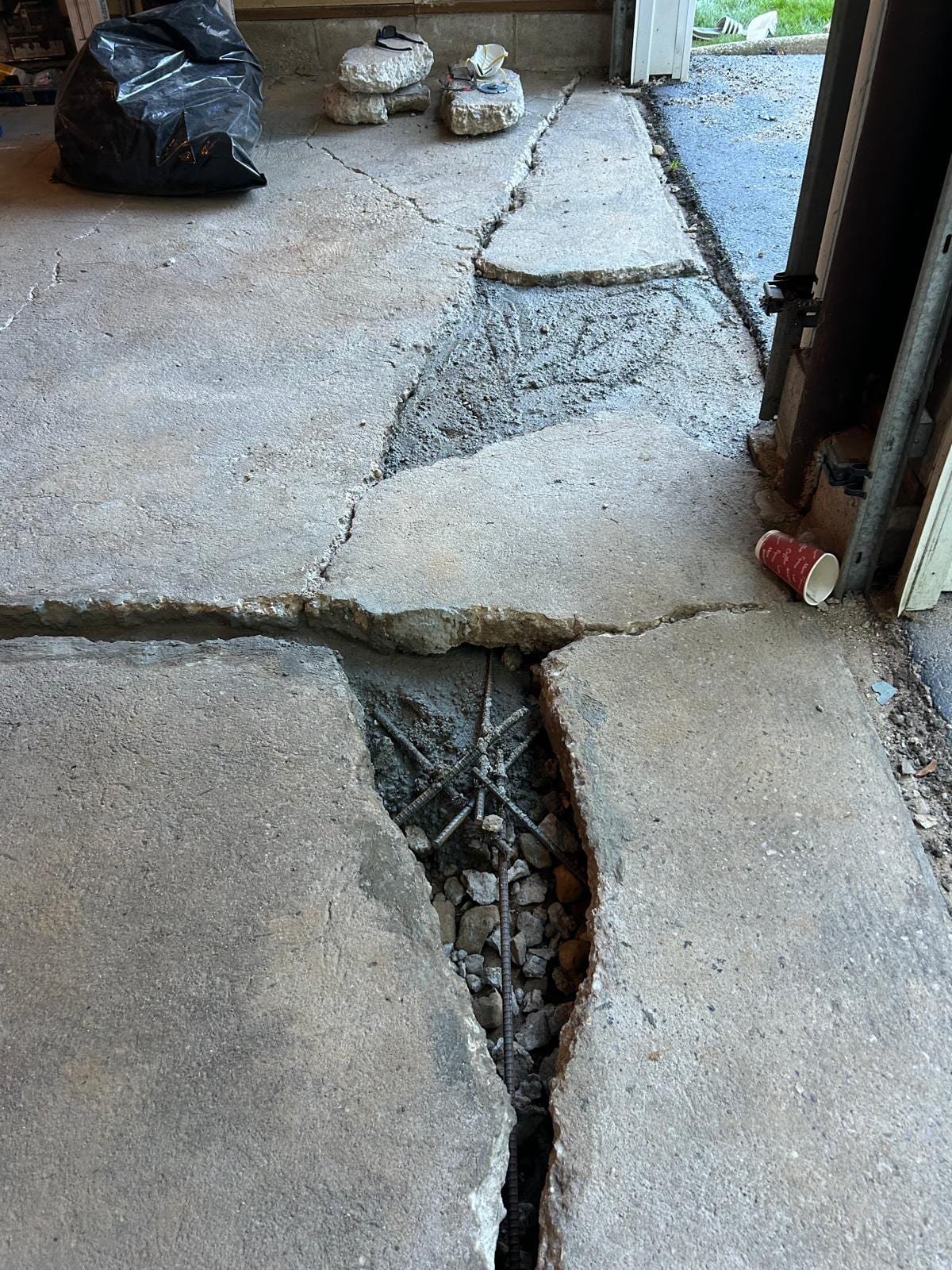 Job-site photo 2: foundation wall crack repair with carbon fiber grid and garage slab rebuild in Westport, CT