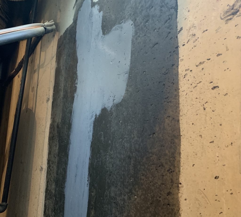 epoxy sealant on wall crack that is being fixed