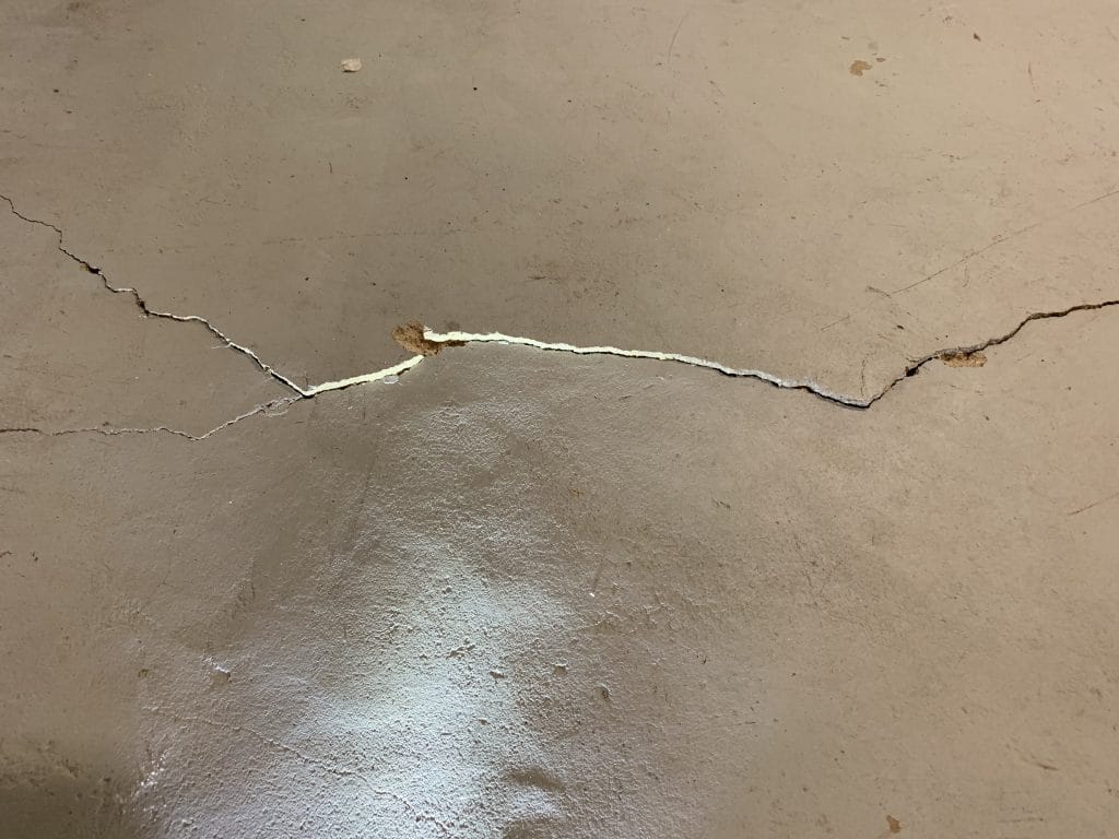 concrete floor deflection crack